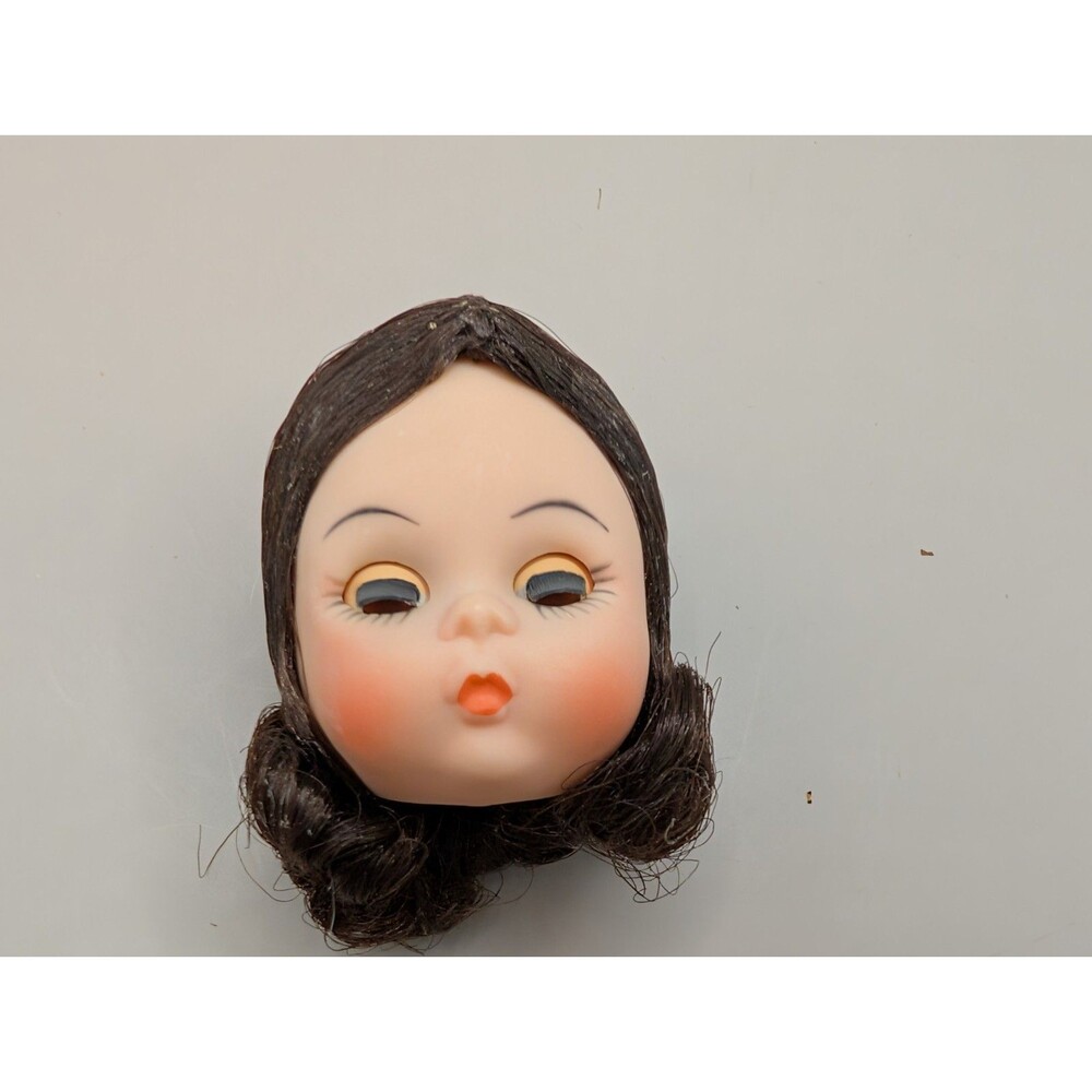 Vintage Madame Alexander Doll head parts replacement black hair.